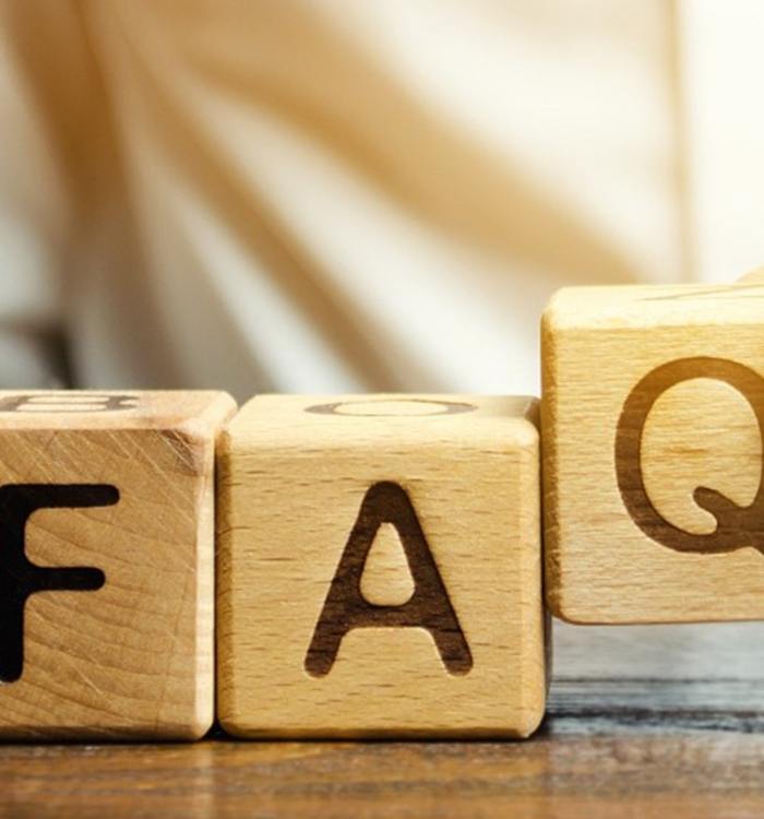 wooden blocks that spell “FAQ” 