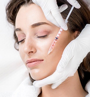 Patient receiving botulinum toxin injection called Botox for facial pain