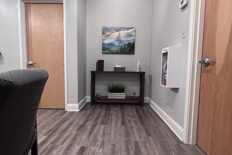 Picture of mountains above a small table