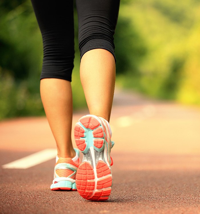 close-up of woman’s feet walking 