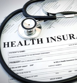 Health insurance document with stethoscope