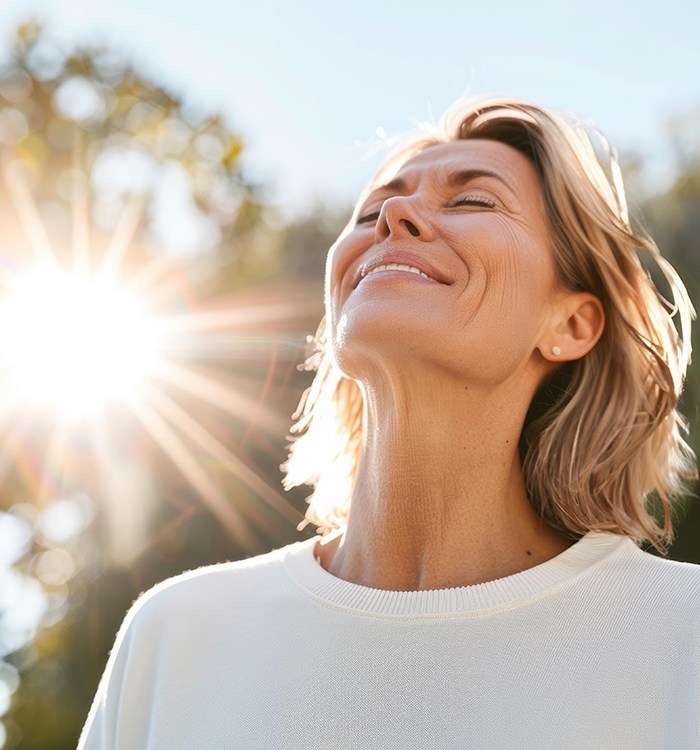 Happy woman enjoying time outdoors