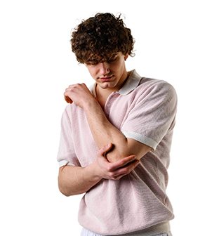 Concerned man with tennis elbow pain