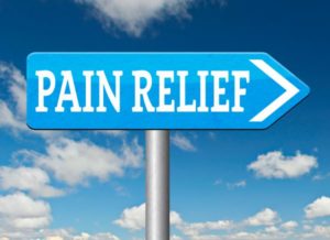 “Pain Relief” sign with arrow pointing to the right