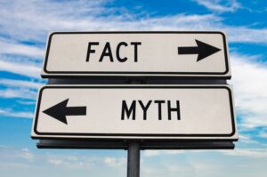 Sign pointing in opposite directions for myths and facts 